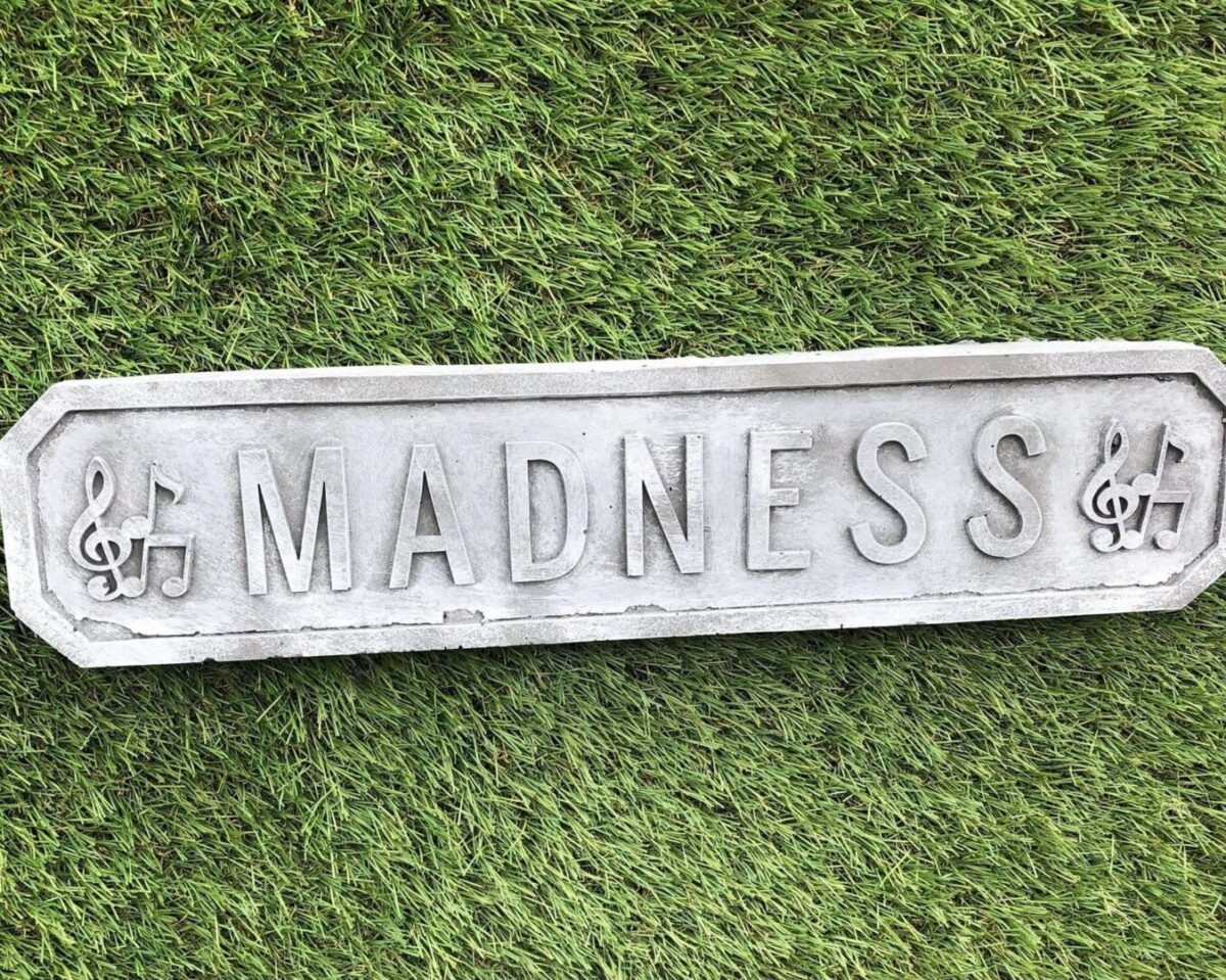 Madness Wall Plaque Concrete Garden Ornament